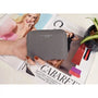 Flora & co Portefeuille porte-carte femme saffiano gris