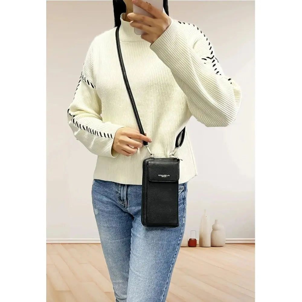 Vue 1 du Pochette téléphone bandoulière femme noir en cuir synthétique par Flora & co.