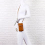 Vue 1 du Pochette téléphone plate tout-en-un femme camel en cuir synthétique par Gallantry.