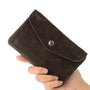 Vue 2 du Grand portefeuille cuir suède compatible passeport Chocolat par Made in Italy.