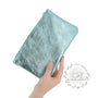 Vue 2 du Pochette coméstique voyage cuir irisé Turquoise par Made in Italy.