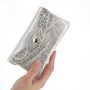 Vue 3 du Porte-monnaie long suédé irisé baroque 05A Argent en cuir par Made in Italy.
