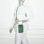 Vue 2 du Pochette téléphone femme croco tout-en-un vert synthétique par Gallantry.