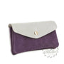 Vue 1 du Porte-monnaie femme irisé suède violet en cuir par Made in Italy.