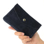 Vue principale du Grand portefeuille cuir suède compatible passeport Bleu Marine en Cuir couleur BLEU MARINE.
