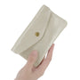 Vue 3 du Porte-monnaie cuir daim irisé femme beige en Cuir couleur BEIGE - Detail.